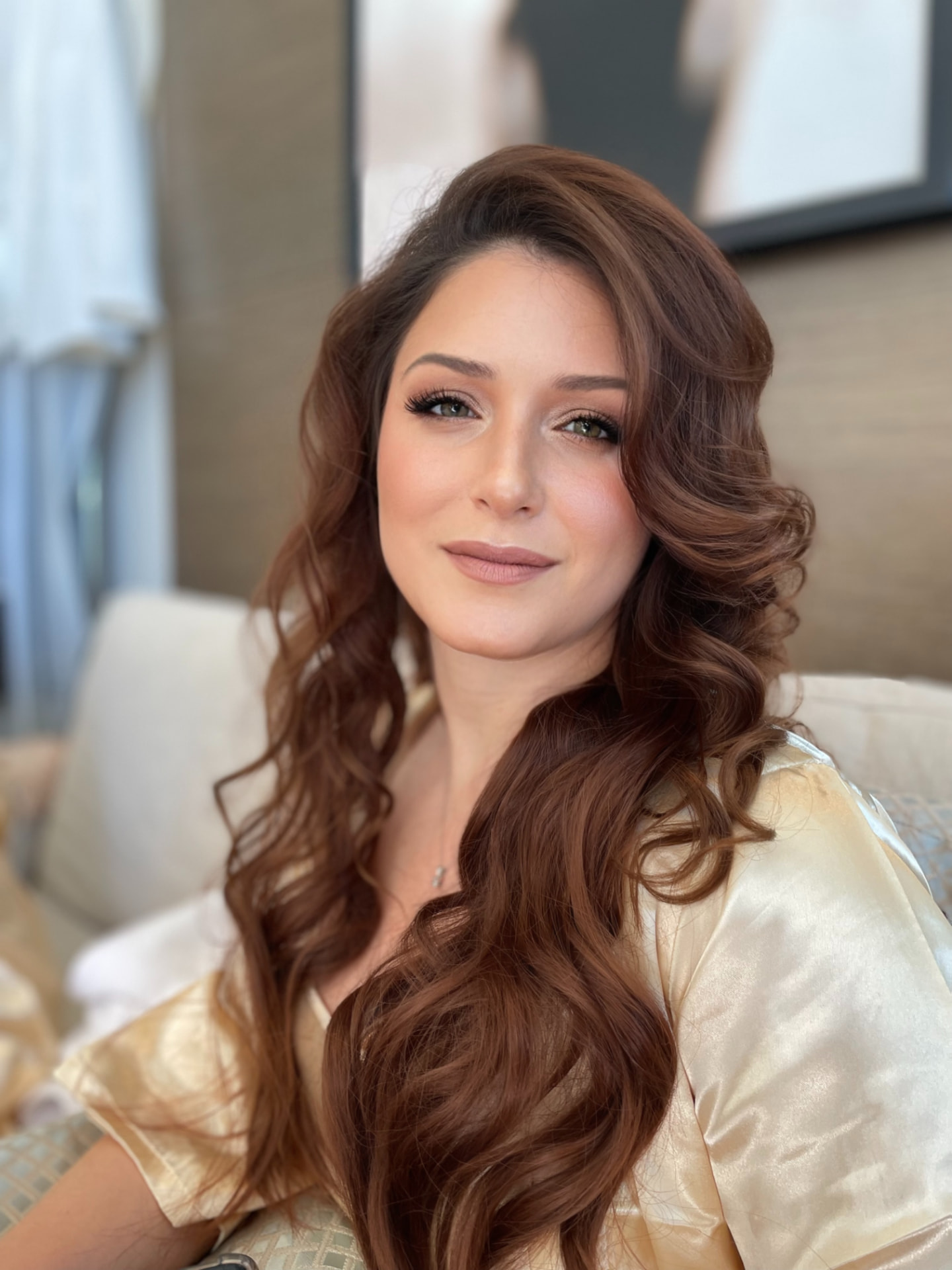 Bridal look by Lee Elrom — soft voluminous auburn waves with neutral glam and nude-mauve lip